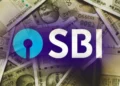 SBI Lakshpati Scheme: প্ৰতিদিনে মাত্ৰ ২০ টকা সঞ্চয় কৰি হওক কোটিপতি!